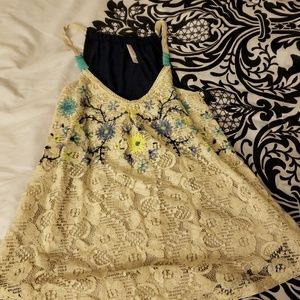 Never worn crocheted flowy floral detail tank.